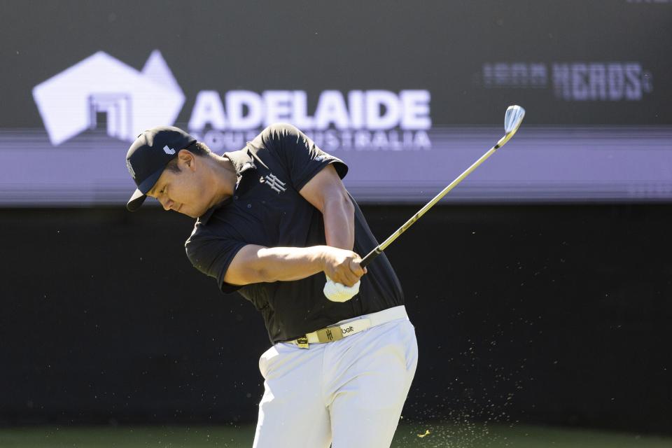 Sihwan Kim, of Iron Heads GC, hit from the 12th tee during the final round of LIV Golf Adelaide at the Grange Golf Club, Sunday, April 23, 2023, in Adelaide, Australia. (Photo by Jon Ferrey/LIV Golf via AP)