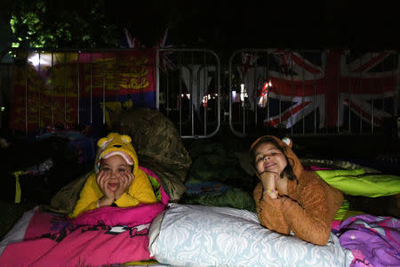 Fans of the royal family camp outside Windsor Castle prior to the wedding of Prince Harry and Meghan Markle in Windsor, Britain May 18, 2018. REUTERS/Clodagh Kilcoyne