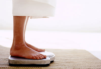 <div class="caption-credit"> Photo by: Stockbyte</div><b>FAT HABIT #18: Not using a scale</b> <br> Looking at your body weight reinforces weight loss goals and makes it difficult to cheat your diet. When University of Minnesota researchers observed dieters who weighed themselves daily, they discovered that the routine of stepping on a scale helped those people lose twice as much weight as those who weighed themselves less frequently. Avoid being thrown of by natural fluctuations in body weight by stepping onto the scale at the same time every day.<b><br></b> <p> <b><a rel="nofollow noopener" href="http://wp.me/p1rIBL-18F" target="_blank" data-ylk="slk:Quick Weight loss;elm:context_link;itc:0;sec:content-canvas" class="link ">Quick Weight loss</a> vs <a rel="nofollow noopener" href="http://wp.me/p1rIBL-18F" target="_blank" data-ylk="slk:Fast Weight Loss;elm:context_link;itc:0;sec:content-canvas" class="link ">Fast Weight Loss </a></b> </p> <br>
