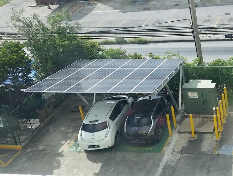 <span class="caption">Solar panels power an electric car charging point in Bridgetown, Barbados.</span> <span class="attribution"><span class="source">Rebekah Shirley</span>, <span class="license">Author provided</span></span>