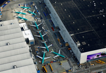 An aerial photo shows Boeing 737 MAX airplanes parked on the tarmac at the Boeing Factory in Renton, Washington, U.S. March 21, 2019. REUTERS/Lindsey Wasson/Files