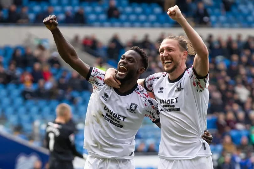 Emmanuel Latte Lath (L) celebrates scoring with Luke Ayling (R) of Middlesbrough