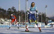 Cross-Country Skiing - Pyeongchang 2018 Winter Olympics - Women's 30km Mass Start Classic - Alpensia Cross-Country Skiing Centre - Pyeongchang, South Korea - February 25, 2018 - Stina Nilsson of Sweden in action to clinch bronze. REUTERS/Carlos Barria