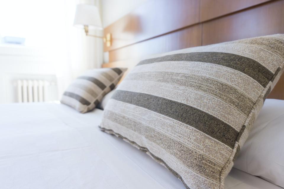 Pillows on a bed in a hotel