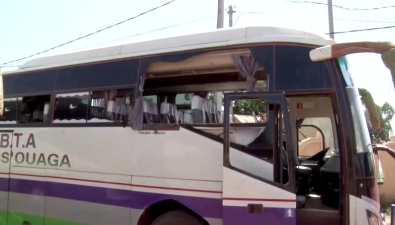 Damaged bus is seen after it was attacked near Fada N'gourma