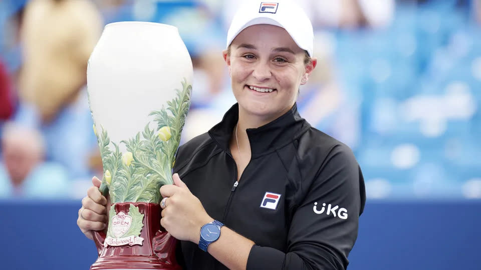 Seen here, Ash Barty holds the trophy aloft after winning the Western & Southern Open.