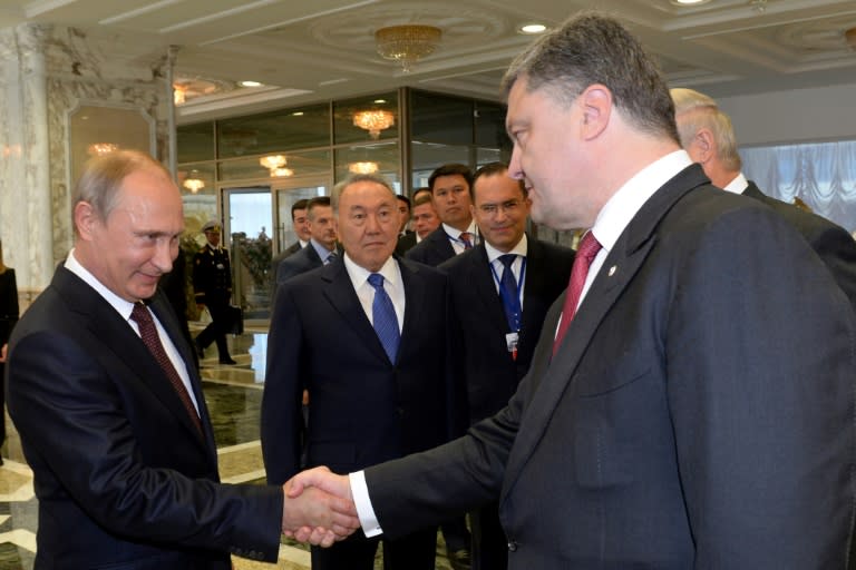 Russian President Vladimir Putin (left) and his Ukrainian counterpart Petro Poroshenko signed the Minsk agreement in 2015, which aimed to stop the fighting in the Donetsk and Lugansk regions of Eastern Ukraine