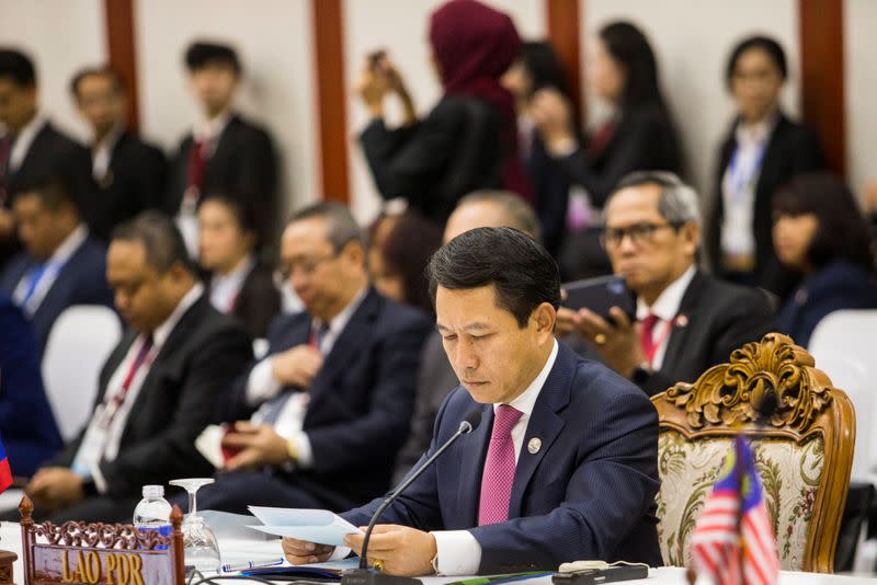 Laos' Foreign Minister Saleumxay Kommasith attends a session during the ASEAN and China emergency meeting on the coronavirus in Vientiane
