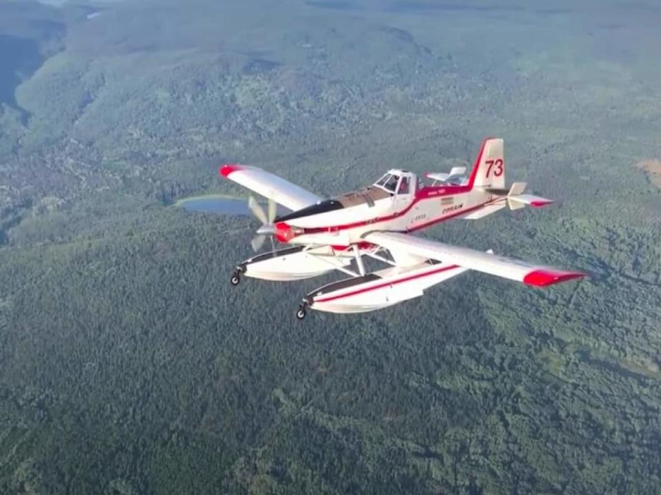 A Conair 802 Air Tractor Fireboss Skimmer aircraft is seen in a video released by the B.C. Wildfire Service in June 2022. (B.C. Wildfire Service/YouTube - image credit)