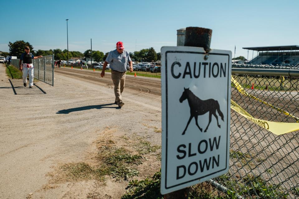 Mike Woebkenber makes his way to the starter truck in between harness races during the Tuscarawas County Fair.