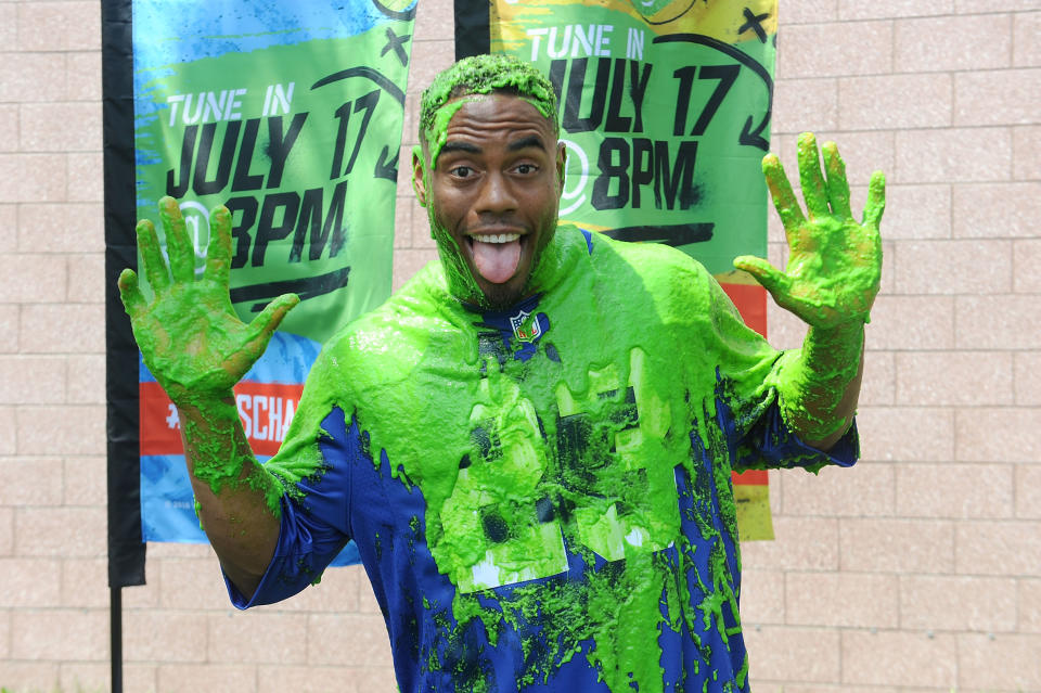 EAST RUTHERFORD, NJ - JUNE 11:  New York Girant Rashad JenningsÊgets slimed at the Nickelodeon And The New York Giants Host Tryouts For The "Triple Shot Challenge: Kids' Choice Sports $50,000 Perfect Pass Challenge" on June 11, 2016 in East Rutherford, New Jersey.  (Photo by Brad Barket/Getty Images for Nickelodeon)
