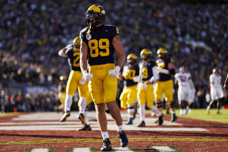 PASADENA, CALIFORNIA - JANUARY 01: Tight end AJ Barner #89 of the Michigan Wolverines celebrates after the team scored a touchdown during the CFP Semifinal Rose Bowl Game at Rose Bowl Stadium on January 1, 2024 in Pasadena, California. (Photo by Ryan Kang/Getty Images)