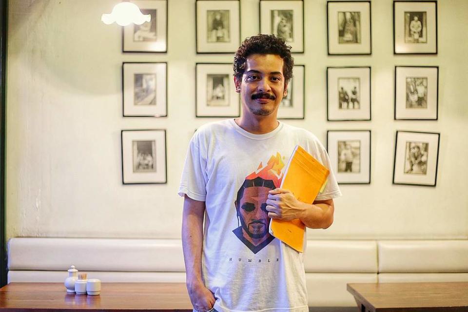 Megat credits his family for being his story behind the art. —  Picture by Ahmad Zamzahuri