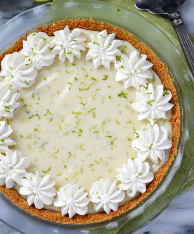 <p><strong>Key Lime Pie</strong><br> Get the recipe<a href="https://www.momontimeout.com/best-key-lime-pie-recipe/" rel="nofollow noopener" target="_blank" data-ylk="slk:here;elm:context_link;itc:0;sec:content-canvas" class="link "><em><strong> here</strong></em></a></p>