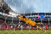 <p>KASHIMA, JAPAN - AUGUST 02: Adrianna Franch #18 of Team United States fails to save a penalty from Jessie Fleming #17 of Team Canada as she goes on to score her side's first goal during the Women's Semi-Final match between USA and Canada on day ten of the Tokyo Olympic Games at Kashima Stadium on August 02, 2021 in Kashima, Ibaraki, Japan. (Photo by Naomi Baker/Getty Images)</p> 