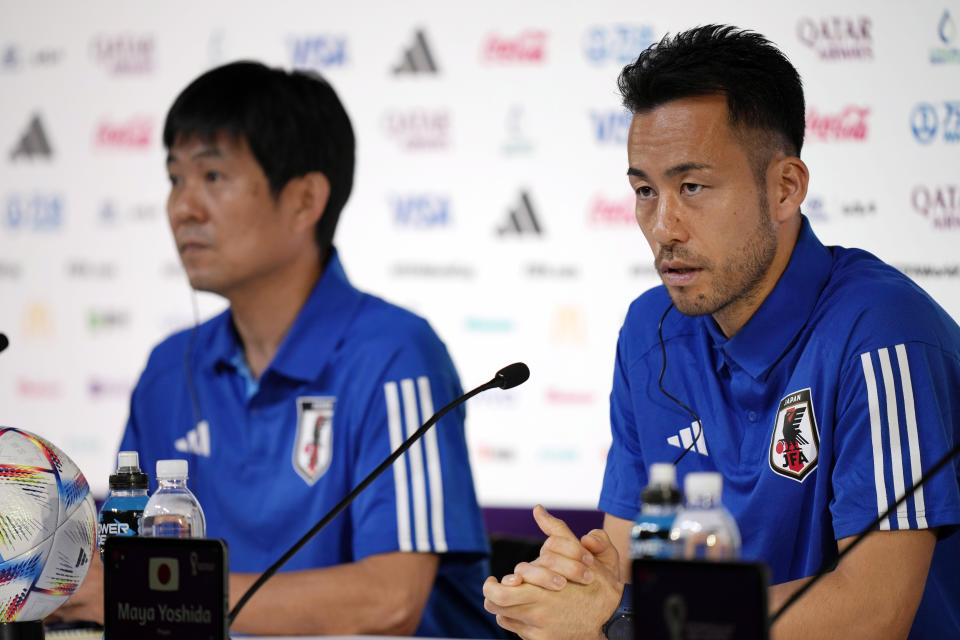 Japan's head coach Hajime Moriyasu, left, and Japan's captain Japan's Maya Yoshida, right, attend the Japan official press conference on the eve of the group E of World Cup soccer match between Japan and Germany, in Doha, Qatar, Tuesday, Nov. 22, 2022. (AP Photo/Eugene Hoshiko)