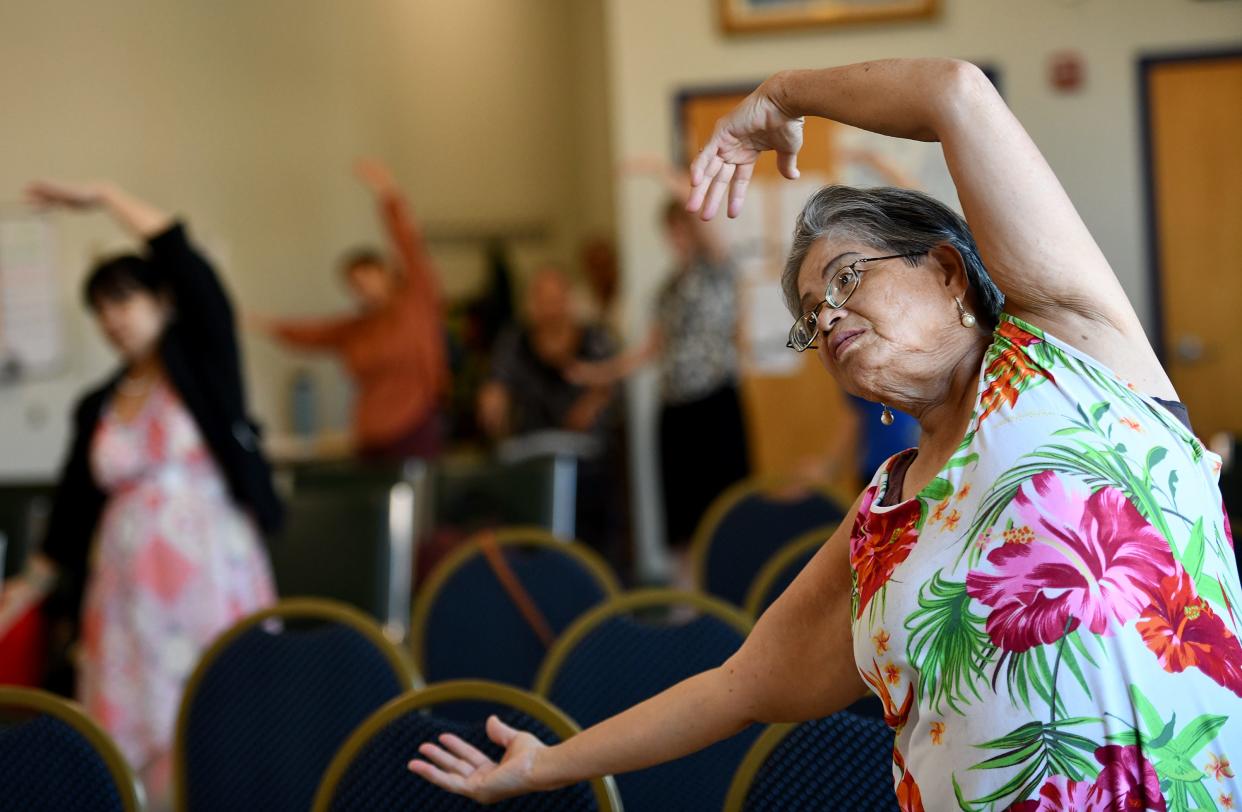 Haikim Tran takes part in a tai chi class Thursday at the Worcester Senior Center.