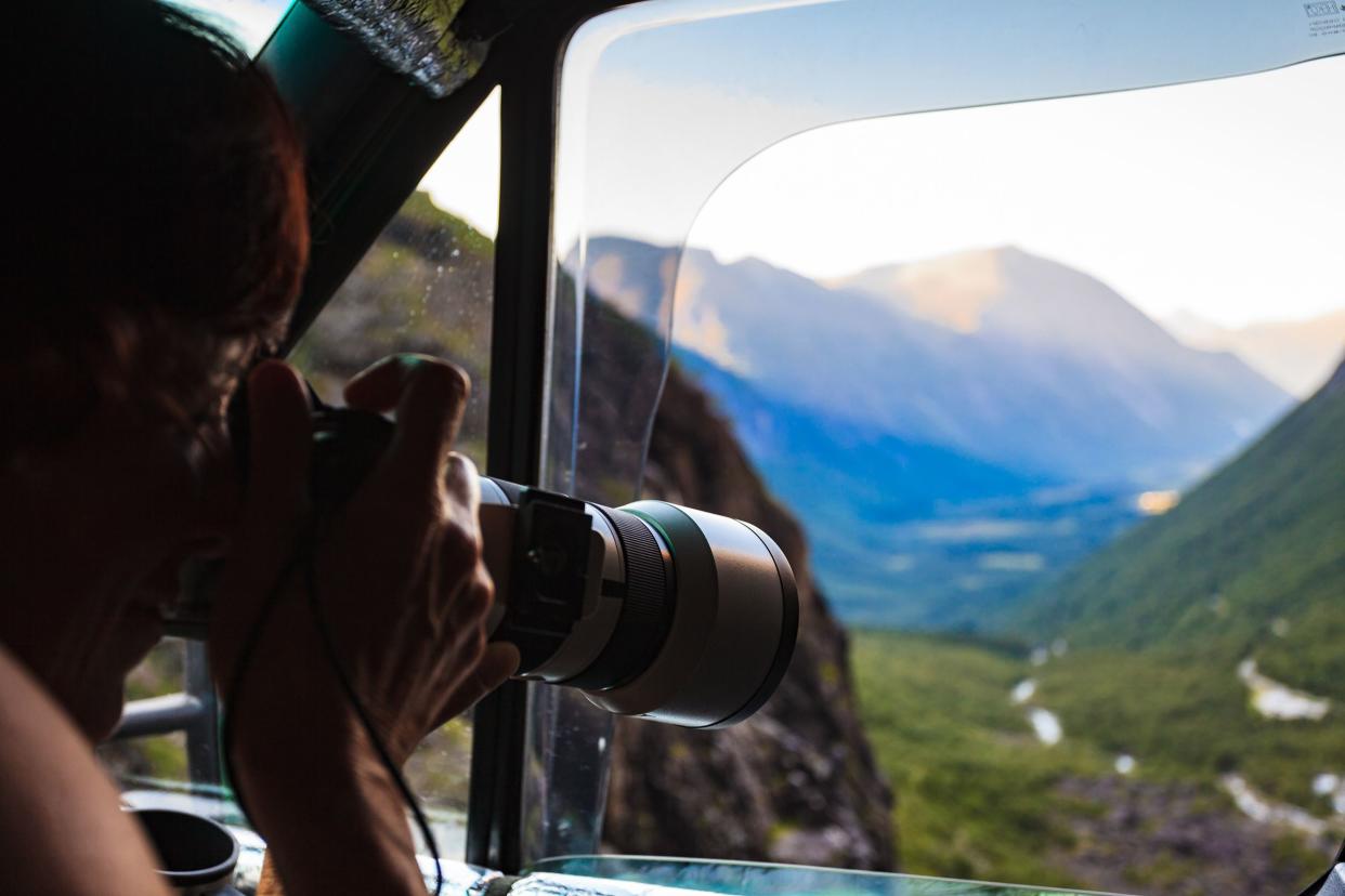 photographer taking photo from camper car