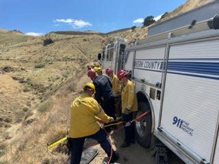 Firefighters with the Kern County Fire Department rescued a person who had been trapped at the bottom of a 100-foot ravine for five days.