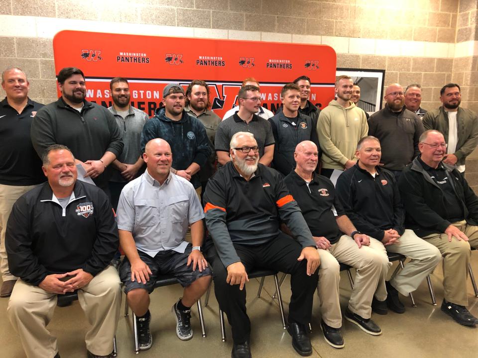 Washington head coach Darrell Crouch (front, center) with players, coaches and staff from the 2013 team at its induction into the Washington High School Hall of Fame in mid-October of 2023.