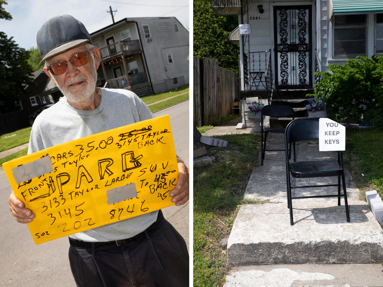 A man holds a sign advertising a parking space in the neighborhood; a resident's chair in front of their home with a 