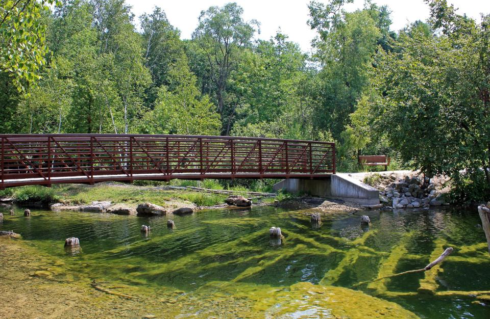 Wooden infrastructure from an early 20th-century limestone quarry remains underwater in Quarry Lake in Harrington Beach State Park.