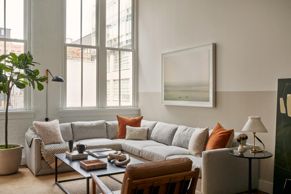 cream and beige two tone living room by DATE Interiors