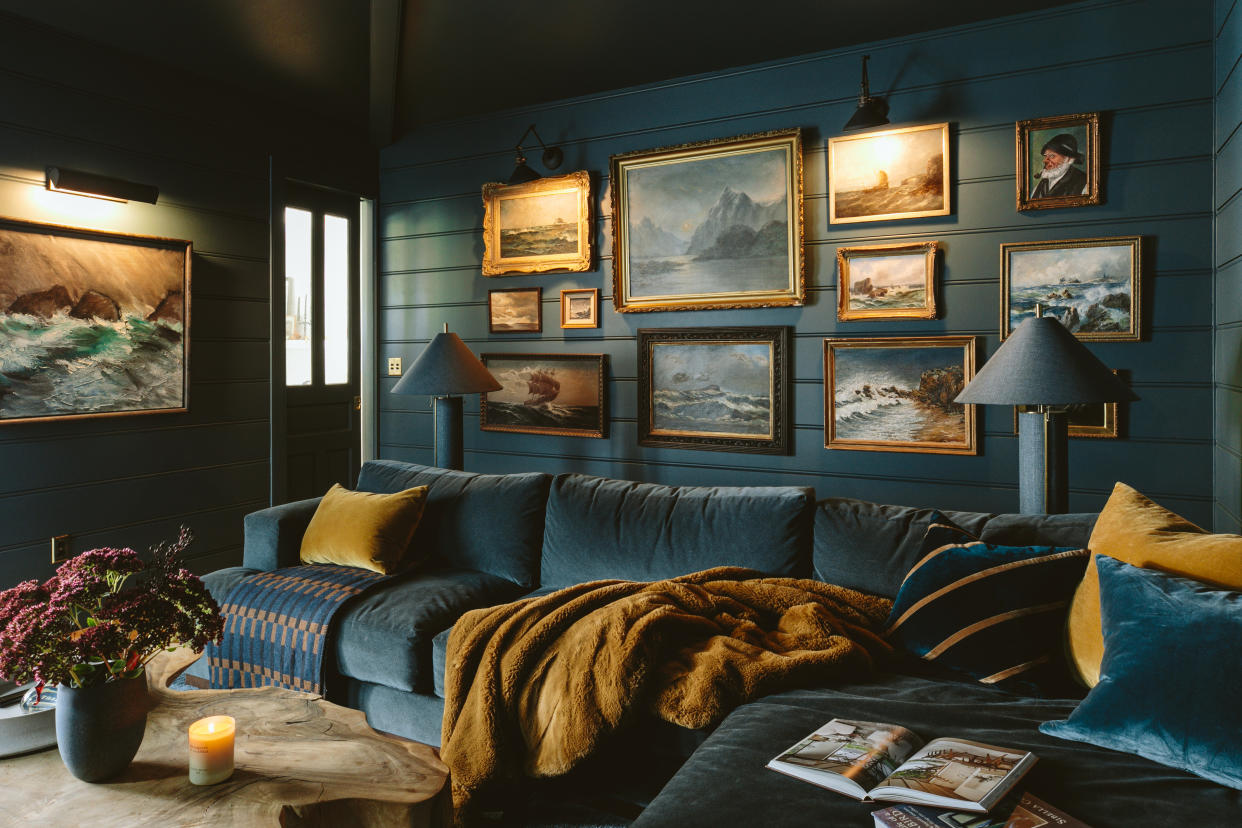  A blue living room with performance velvet sofa. 