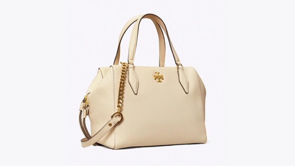 This white-and-gold satchel features top-quality pebbled leather.