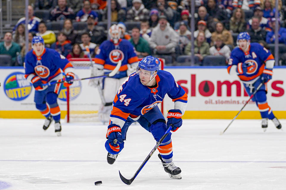 New York Islanders center Jean-Gabriel Pageau (44) skates with the puck during the second period of the team's NHL hockey game against the Boston Bruins in Elmont, N.Y., Friday, Dec. 15, 2023. (AP Photo/Peter K. Afriyie)