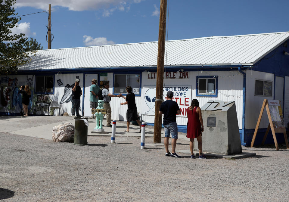 Attendees arrive at the Little A'Le'Inn as an influx of tourists responding to a call to 'storm' Area 51, a secretive U.S. military base believed by UFO enthusiasts to hold government secrets about extra-terrestrials, is expected in Rachel, Nevada,Sept. 19, 2019. (Photo: Jim Urquhart/Reuters)