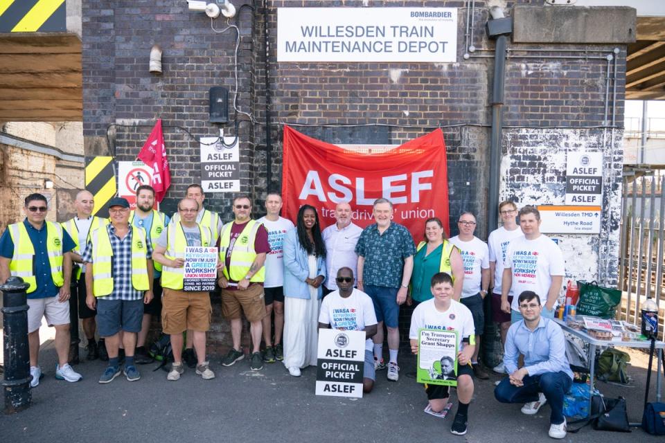 Aslef general secretary Mick Whelan (centre) and Labour MPs Dawn Butler and Barry Gardiner at a picket line at Willesden Junction station in London (Dominic Lipinski/PA) (PA Wire)