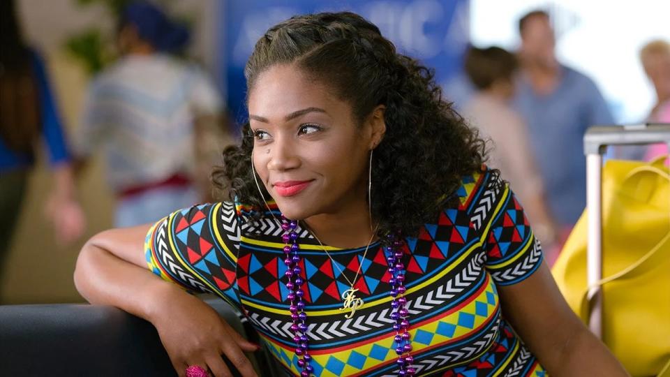  Tiffany Haddish wearing brightly-colored outfit in Girls Trip 