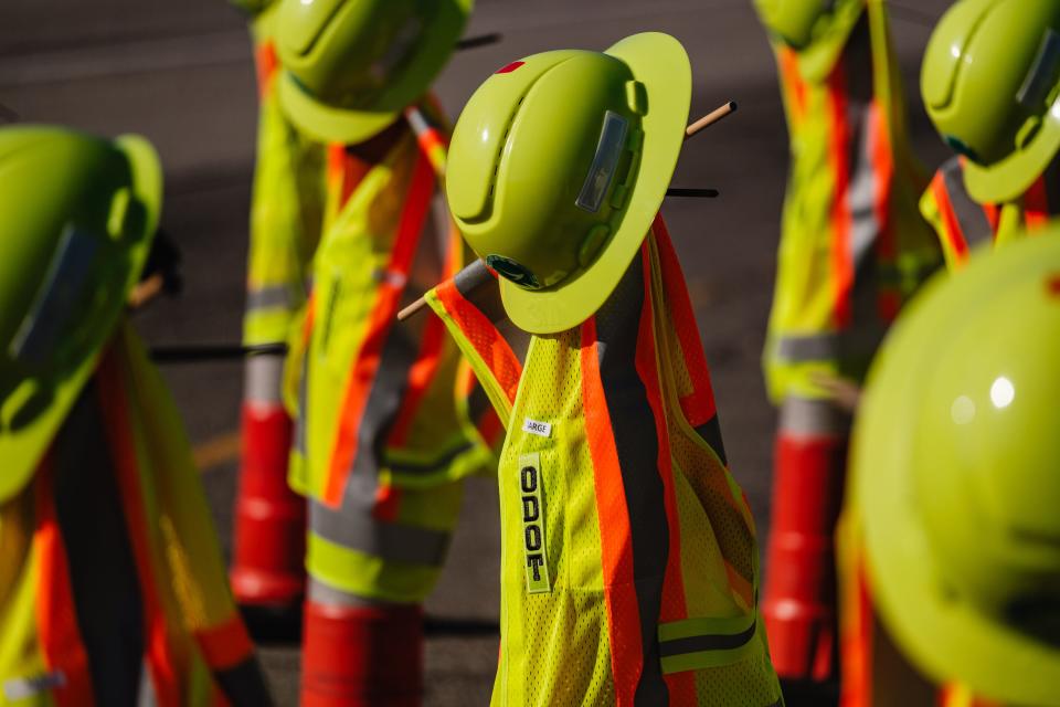 A work zone safety display created by the Ohio Department of Transportation is seen along I-77 in northern Tuscarawas County during National Work Zone Awareness Week, Tuesday, April 16. The cones represent the numbers of workers struck while working on Ohio's roads in 2024, according to ODOT.