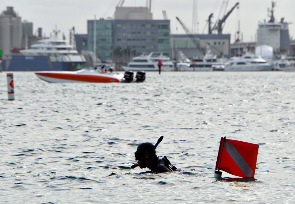 Carter Viss, who lost an arm in November 2019 when a boat hit him in the water, is working to pass a state law requiring the use of more visible diver-down markers than the two-dimensional flags common in local waters. Richard Graulich/The Palm Beach Post file photo