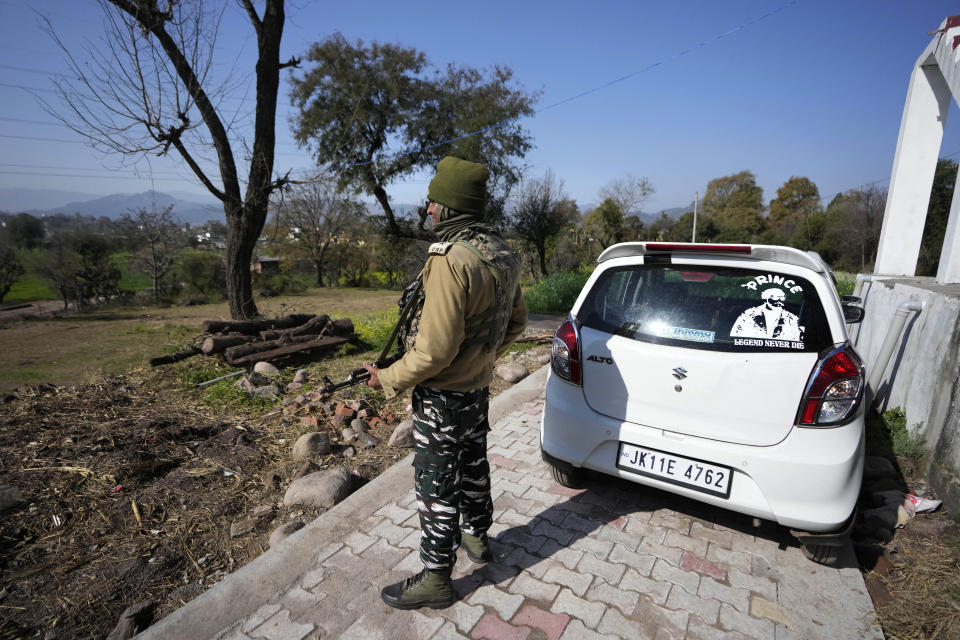 An Indian paramilitary soldier stands guard at Dhangri Village, in Rajouri, India, Feb. 7, 2023. Days after seven Hindus were killed in the village in disputed Kashmir, Indian authorities revived a government-sponsored militia and began rearming and training villagers. The militia, officially called the “Village Defense Group,” was initially formed in the 1990s as the first line of defense against anti-India insurgents in remote villages that government forces could not reach quickly. (AP Photo/Channi Anand)