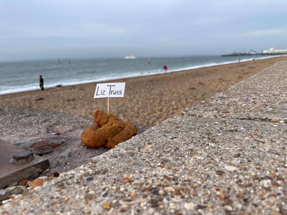 A fake poo placed in protest against Prime Minister Liz Truss on the promenade at Southsea, Hampshire (Ben Mitchell/PA)