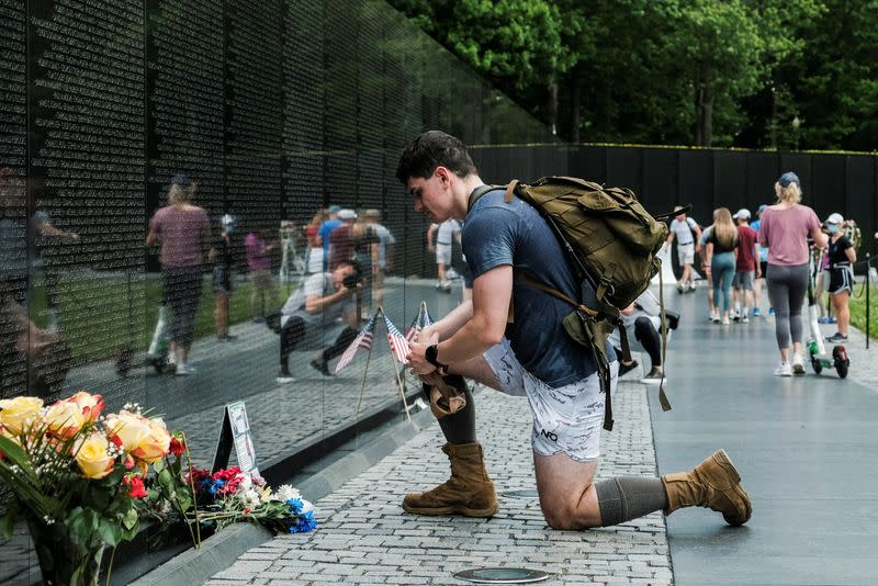 Veterans and members of the public visit the Vietnam Veterans Memorial on Memorial Day holiday in Washington