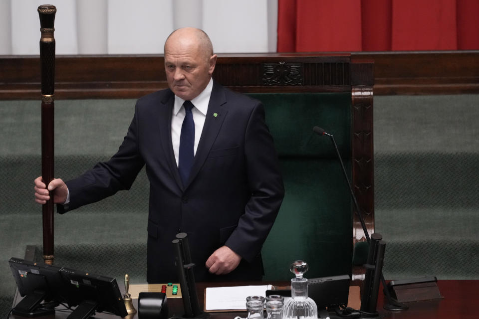 Senior Speaker of the Sejm Marek Sawicki opens the first session of the lower house, of the newly-elected parliament in Warsaw, Poland, Monday Nov. 13, 2023. The Polish parliament gathered for the first time Monday after an election last month heralded a change of course for the Central European nation at a time of war across the border in Ukraine. (AP Photo/Czarek Sokolowski)