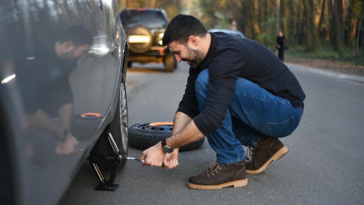 A broken tire on the car.