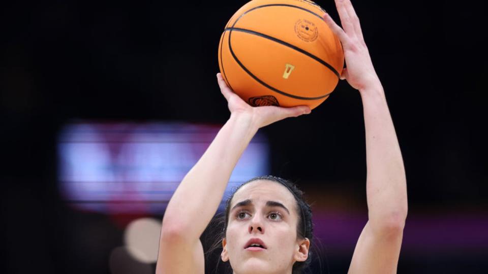 <div>CLEVELAND, OHIO - APRIL 05: Caitlin Clark #22 of the Iowa Hawkeyes shoots the ball in the second half during the NCAA Women's Basketball Tournament Final Four semifinal game against the UConn Huskies at Rocket Mortgage Fieldhouse on April 05, 2024 in Cleveland, Ohio. (Photo by Steph Chambers/Getty Images)</div>