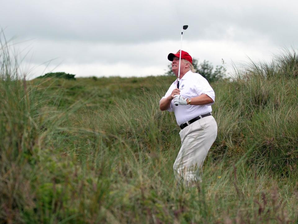 Donald Trump plays a round of golf after the opening of the Trump International Golf Links Course on 10 July, 2012, in Balmedie, Scotland: Ian MacNicol/Getty Images