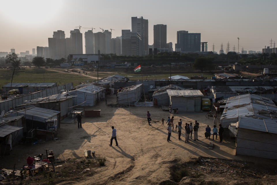 A migration worker settlement, whose inhabitants mostly work on construction sites, on the property of one of the future building projects by Donald Trump in Gurgaon, Haryana. Photo: Enrico Fabian for The Washington Post