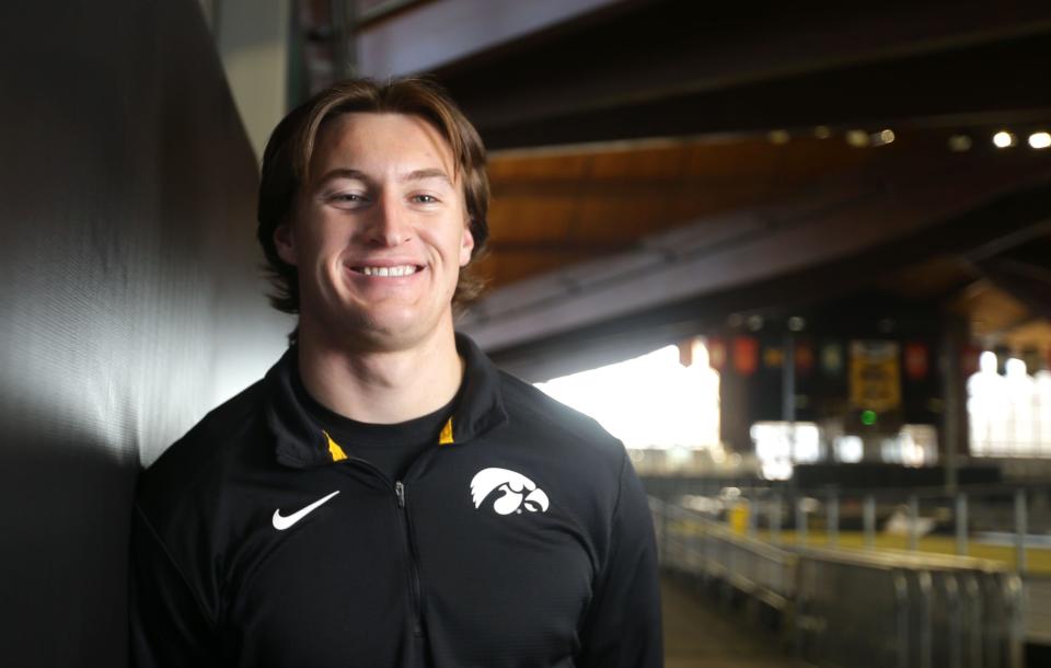 Austin West, a University of Iowa heptathlete, poses for a portrait Wednesday, Nov. 29, 2023 at the Recreation Building on the University of Iowa Campus.