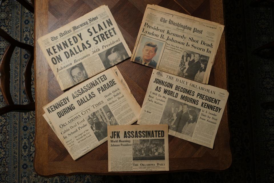 This photo taken Friday shows U.S. District Judge Tim Leonard's collection of Nov. 22-23, 1963, newspapers from The Daily Oklahoman, OKC Times, Oklahoma Daily, Washington Post and the Dallas Morning News on the Kennedy assassination.