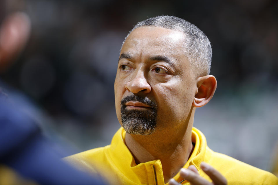 Michigan coach Juwan Howard watches during the first half of an NCAA college basketball game against Michigan State, Tuesday, Jan. 30, 2024, in East Lansing, Mich. (AP Photo/Al Goldis)