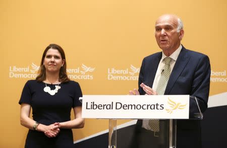 Vince Cable, the new leader of Britain's Liberal Democrats speaks next to new deputy leader Jo Swinson in London, July 20, 2017. REUTERS/Neil Hall