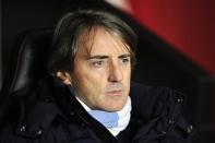 Manchester City manager Roberto Mancini saw his side lose 3-1 at Southampton, on February 9, 2013. Mancini's side needed a victory at St Mary's to keep the pressure on leaders Manchester United, but instead they slumped to their third league defeat of the season