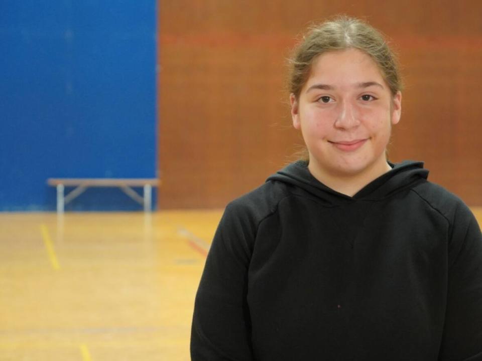 Amanda La Rocca, a Grade 11 student at John F. Kennedy High School, says the Hockey 4 Youth program is the reason she still plays hockey today. The organization is trying to implement the program at a school in Montréal-Nord, but it's facing challenges due to lack of accessibility to sports facilities in the borough.  (Dave St-Amant/CBC News - image credit)