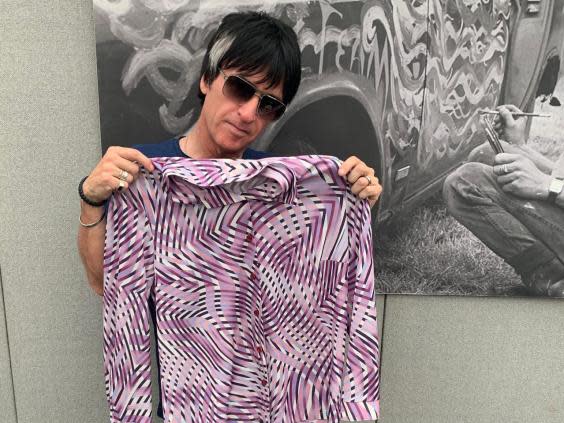 Johnny Marr has donated a purple shirt with a psychedelic print (Lewis Allman)